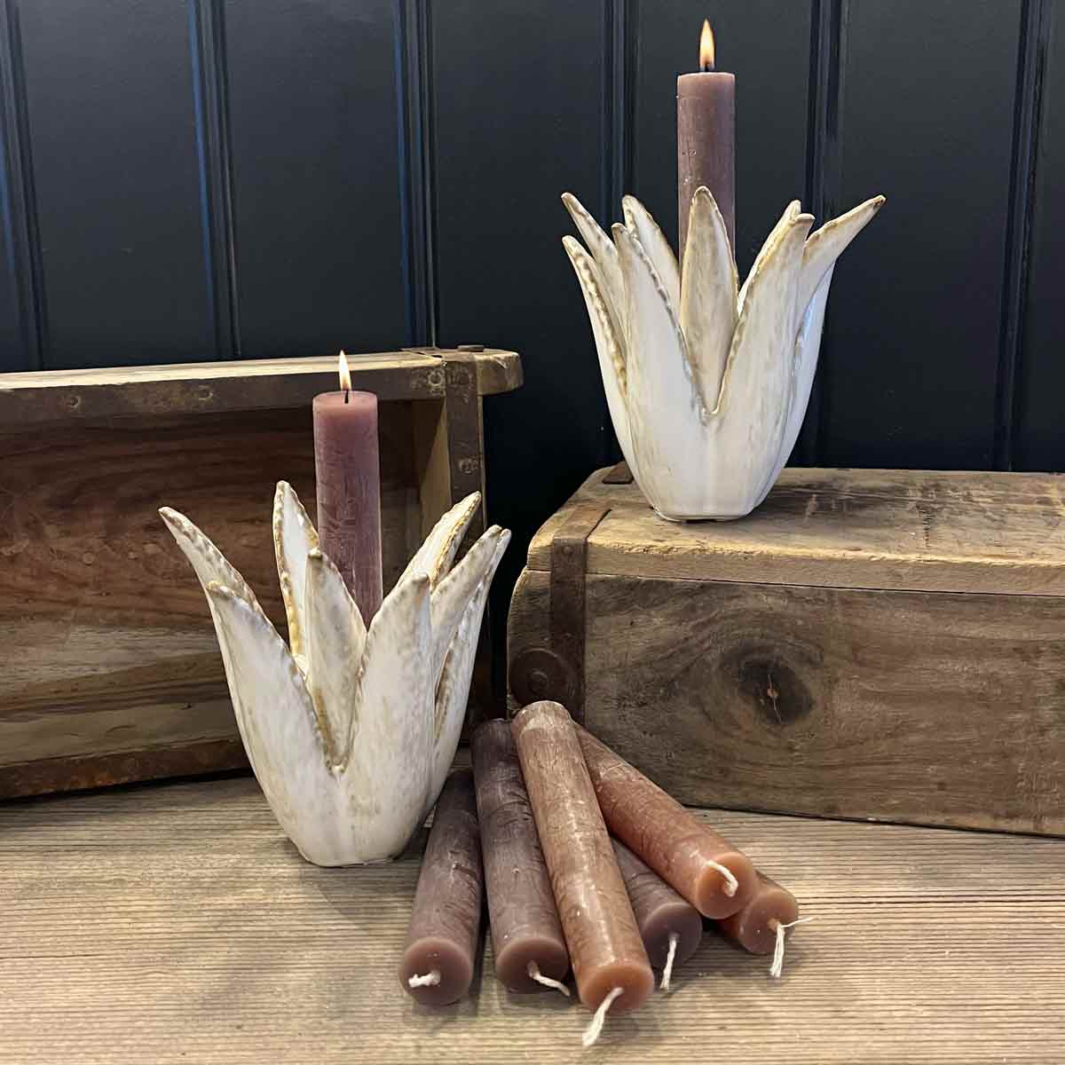 Cactus Ceramic Candlestick in cream, styled with rustic wooden elements and taper candles in warm, earthy tones.