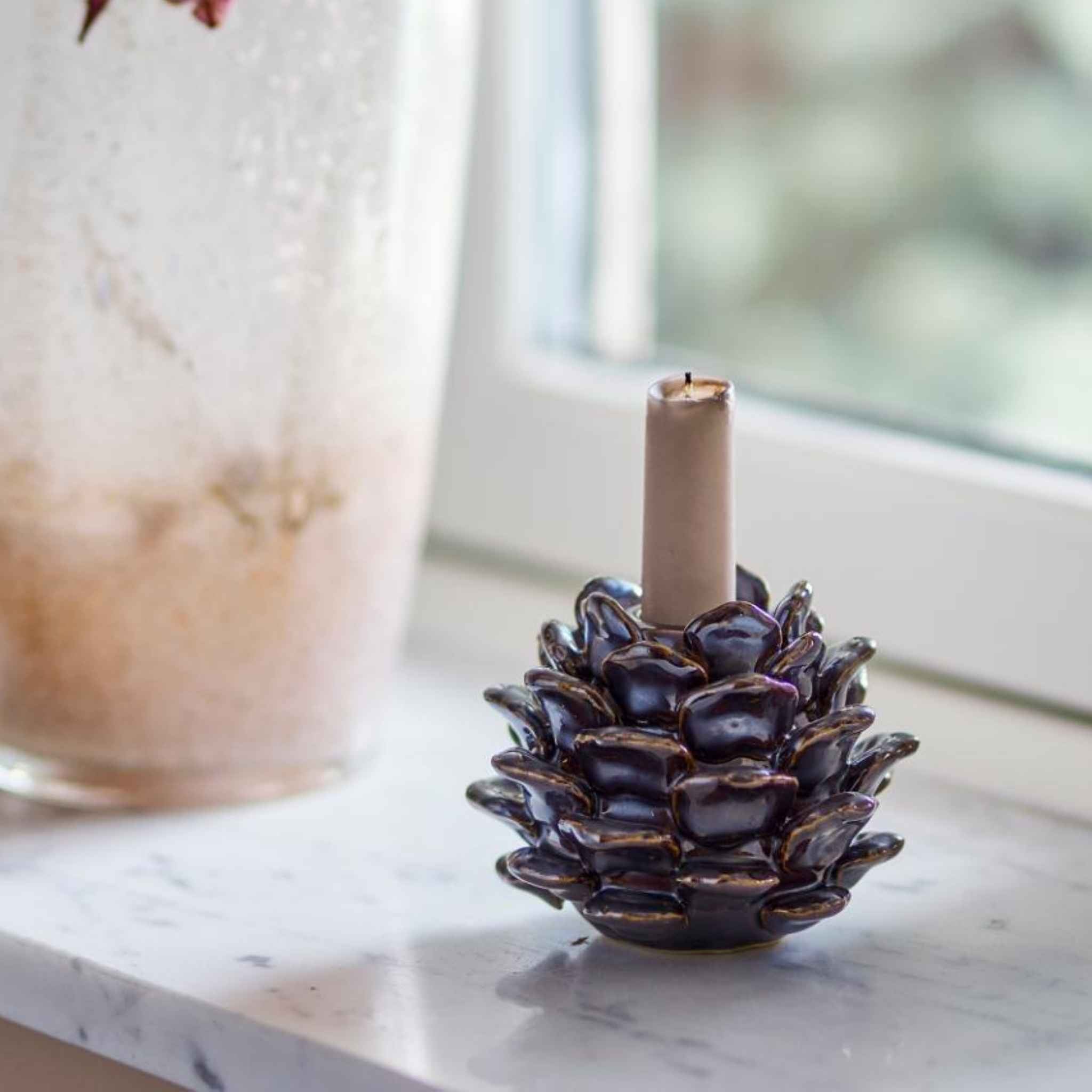 Pine Cone Holder - Brown Stoneware - Small - Displated on Window with candle