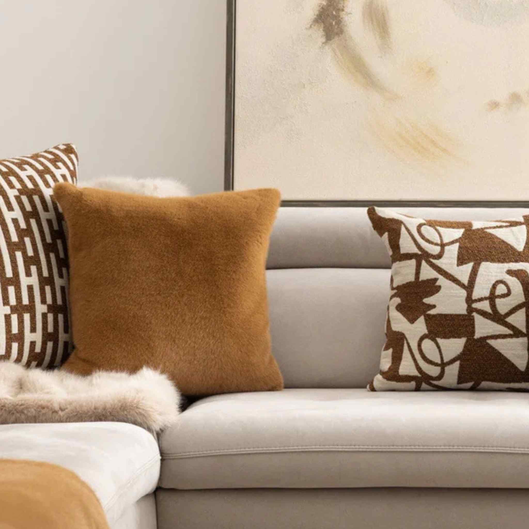 Ralph Square Cushion in Cognac - Displayed on Sofa