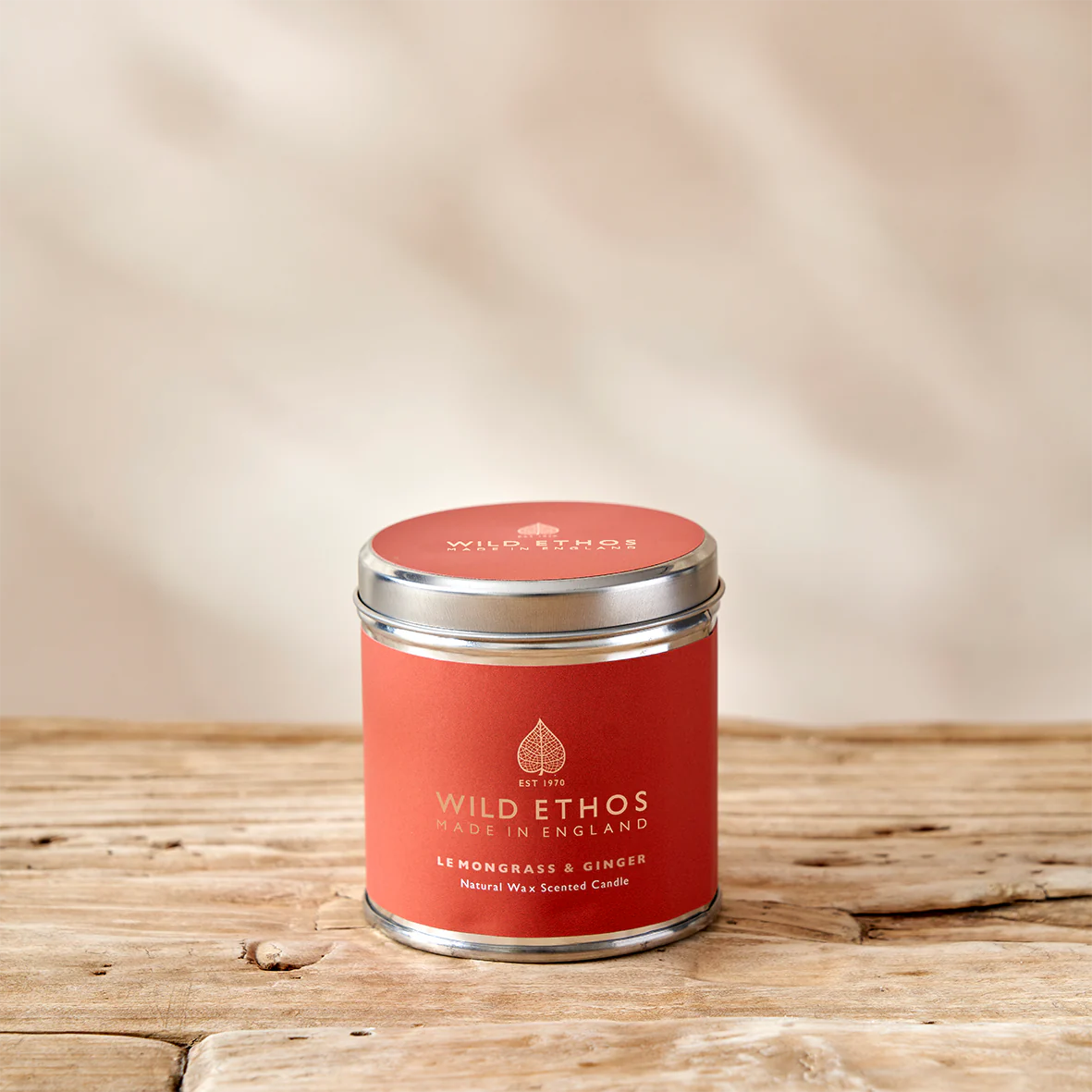 Wild Ethos Lemongrass and Ginger Tin Candle - Wooden Table
