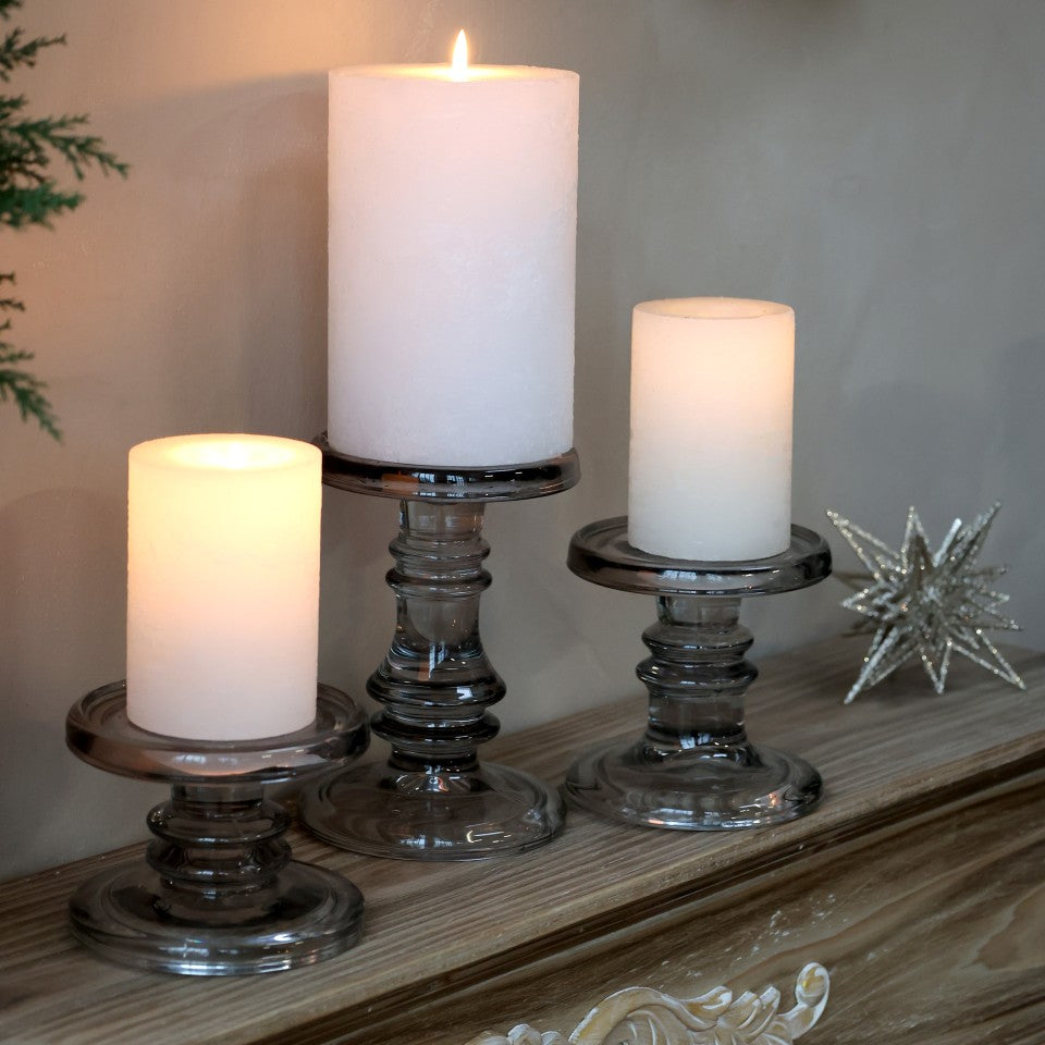 coal glass candlesticks on mantelpiece