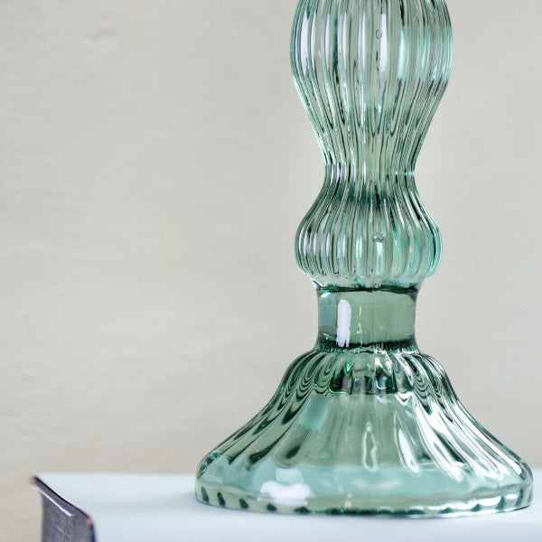 Close up of bella green glass candlestick