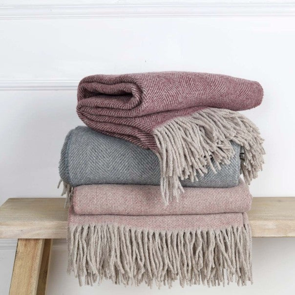 Stack of Pure Wool Throws