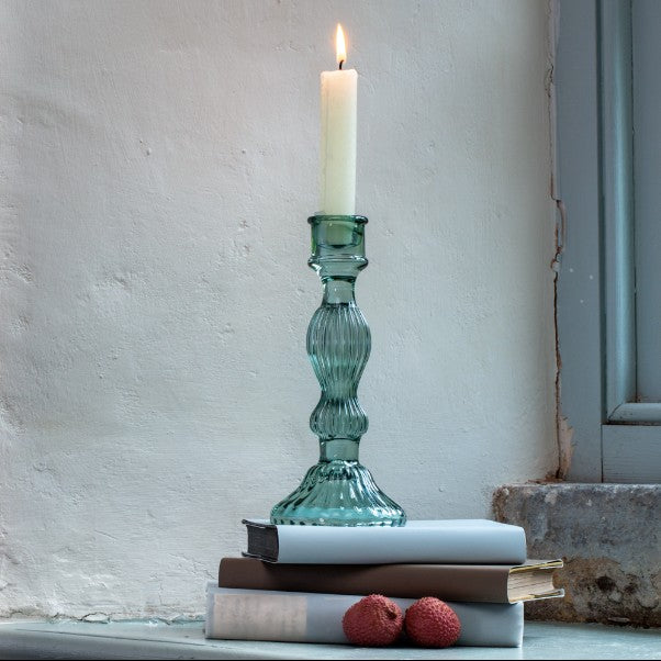 Tall green glass candlestick